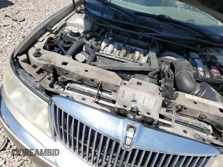 2001 Lincoln Continental with VIN 1LNHM97V21Y698784, listed as a Copart auction lot 64040134 with Not Provided miles and Salvage Title. Bid and sale history available at DreamBid. Image 11.