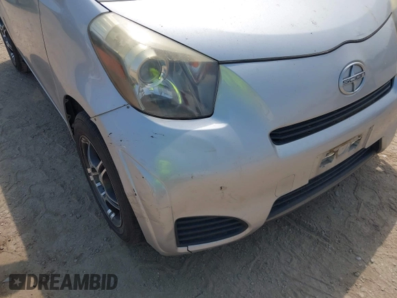 2012 Scion iQ with VIN JTNJJXB02CJ015746, listed as a IAAI auction lot 42266761 with 135,321 mi miles and . Bid and sale history available at DreamBid. Image 12.