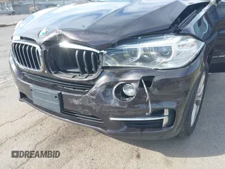 2014 BMW X5 xDrive35i with VIN 5UXKR0C57E0H20944, listed as a IAAI auction lot 42011451 with 208,205 mi miles. Bid and sale history available at carsss.com. Image 6.