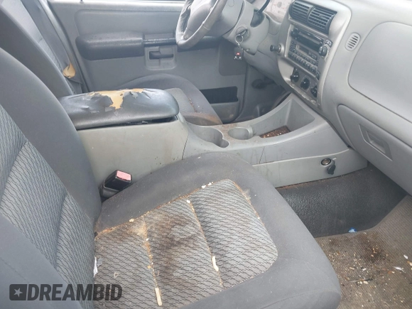 2003 Ford Explorer Sport Trac XLS z VIN 1FMZU67E63UC48939, wystawiony jako IAAI lot #42526151 z przebiegiem 221 402 mil mil oraz . Historia ofert i sprzedaży dostępna na DreamBid. Obrazek 5.
