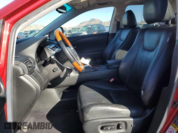 2010 Lexus RX 450h with VIN JTJZB1BA1A2002890, listed as a Copart auction lot 80060764 with 106,880 mi miles and Salvage Title. Bid and sale history available at DreamBid. Image 7.
