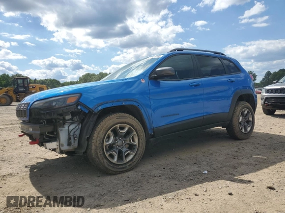 2019 Jeep Cherokee Trailhawk with VIN 1C4PJMBX0KD311114, listed as a Copart auction lot 58799765 with 60,833 mi miles and Salvage title. Bid and sale history available at DreamBid. Image 1.