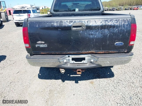 2000 Ford F-150 XL with VIN 1FTRX18L6YKB06492, listed as a IAAI auction lot 42058110 with 169,217 mi miles. Bid and sale history available at carsss.com. Image 6.