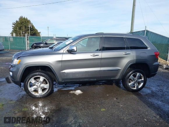 2013 Jeep Grand Cherokee Overland with VIN 1C4RJFCG8DC581719, listed as a IAAI auction lot 41566666 with 152,332 mi miles. Bid and sale history available at carsss.com. Image 14.
