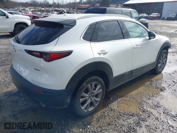 2024 Mazda CX-30 S Premium with VIN 3MVDMBDM5RM630460, listed as a IAAI auction lot 41135965 with 5,544 mi miles and . Bid and sale history available at DreamBid. Image 4.