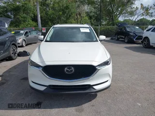 2018 Mazda CX-5 Grand Touring with VIN JM3KFBDM6J0451605, listed as a IAAI auction lot 42099182 with 81,703 mi miles and . Bid and sale history available at DreamBid. Image 12.