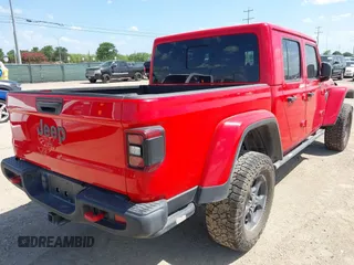 2023 Jeep Gladiator Rubicon z VIN 1C6JJTBG2PL509200, wystawiony jako IAAI lot #42537312 z przebiegiem Nie podano mil oraz . Historia ofert i sprzedaży dostępna na DreamBid. Obrazek 4.