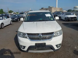2012 Dodge Journey SXT with VIN 3C4PDCBG0CT206649, listed as a IAAI auction lot 42853311 with 146,686 mi miles and . Bid and sale history available at DreamBid. Image 6.