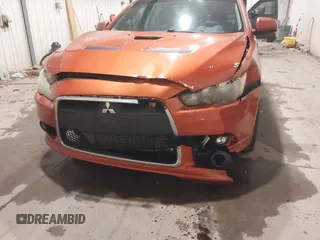 2009 Mitsubishi Lancer with VIN JA3AV66V09U023701, listed as a IAAI auction lot 41246365 with 204,115 mi miles and . Bid and sale history available at DreamBid. Image 6.