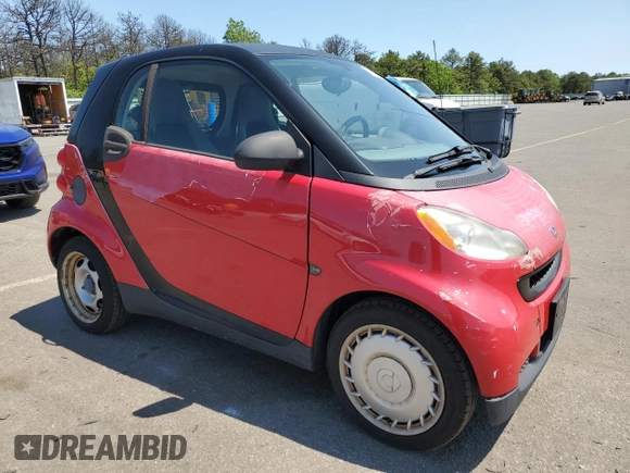 2009 Smart fortwo Pure with VIN WMEEJ31X49K322711, listed as a Copart auction lot 58749945 with 58,919 mi miles and Clean title. Bid and sale history available at DreamBid. Image 4.