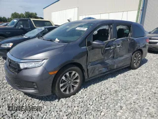 2023 Honda Odyssey EX-L z VIN 5FNRL6H60PB058132, wystawiony jako Copart lot #57802385 z przebiegiem 17 248 mil mil oraz Szkoda całkowita • Salvage title. Historia ofert i sprzedaży dostępna na DreamBid. Obrazek 1.