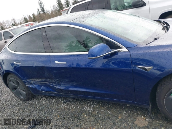2019 Tesla Model 3 Long Range with VIN 5YJ3E1EB8KF512950, listed as a IAAI auction lot 41836349 with 55,607 mi miles and . Bid and sale history available at DreamBid. Image 13.