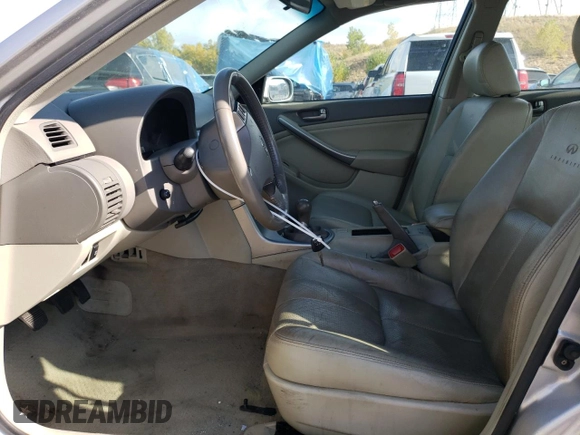 2003 Infiniti G35 w/Leather with VIN JNKCV51E73M314861, listed as a Copart auction lot 74924954 with 70,886 mi miles and Salvage Title. Bid and sale history available at DreamBid. Image 7.