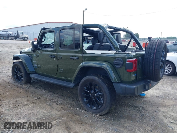 2023 Jeep Wrangler Sahara with VIN 1C4JJXP60PW556336, listed as a IAAI auction lot 39553199 with 10,437 mi miles and . Bid and sale history available at DreamBid. Image 3.
