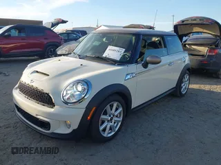 2013 MINI Hardtop S with VIN WMWSV3C53DT479714, listed as a IAAI auction lot 41685283 with 61,904 mi miles and . Bid and sale history available at DreamBid. Image 2.