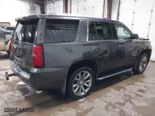 2016 Chevrolet Tahoe LTZ with VIN 1GNSKCKC7GR455033, listed as a IAAI auction lot 40811560 with 165,845 mi miles. Bid and sale history available at carsss.com. Image 4.