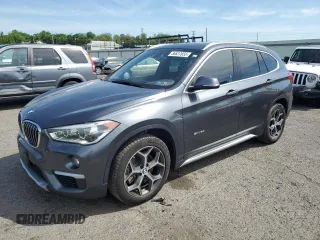 2017 BMW X1 sDrive28i z VIN WBXHU7C37H5H34094, wystawiony jako Copart lot #56637655 z przebiegiem 66 208 mil mil oraz Szkoda całkowita • Salvage title. Historia ofert i sprzedaży dostępna na DreamBid. Obrazek 1.