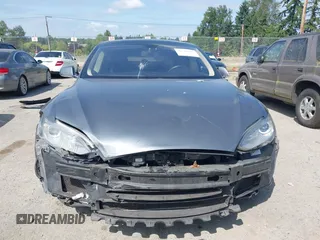 2014 Tesla Model S 60 with VIN 5YJSA1H18EFP38078, listed as a IAAI auction lot 42748619 with 159,285 mi miles and . Bid and sale history available at DreamBid. Image 12.