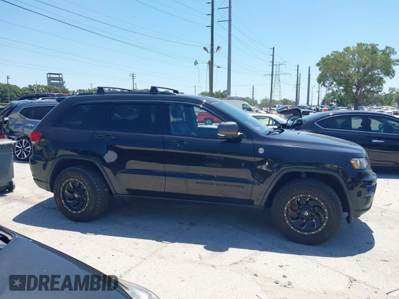 2017 Jeep Grand Cherokee Trailhawk with VIN 1C4RJFLG3HC836072, listed as a IAAI auction lot 42073775 with 139,374 mi miles and . Bid and sale history available at DreamBid. Image 13.