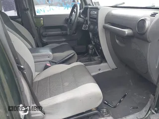 2007 Jeep Wrangler Unlimited X with VIN 1J4GA39127L231378, listed as a IAAI auction lot 42252475 with 152,568 mi miles and . Bid and sale history available at DreamBid. Image 5.