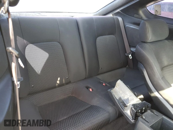 2008 Hyundai Tiburon GS z VIN KMHHM66D08U291605, wystawiony jako Copart lot #46589265 z przebiegiem 177 104 mil mil oraz Szkoda całkowita • Salvage title. Historia ofert i sprzedaży dostępna na DreamBid. Obrazek 11.