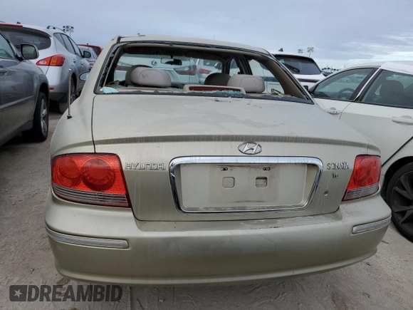 2004 Hyundai Sonata GLS with VIN KMHWF35H74A029127, listed as a Copart auction lot 76701124 with 0 mi miles and Salvage Title. Bid and sale history available at carsss.com. Image 6.