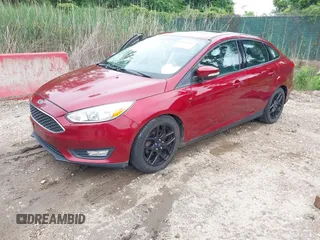 2016 Ford Focus SE with VIN 1FADP3F28GL266971, listed as a IAAI auction lot 42366561 with 67,390 mi miles and . Bid and sale history available at DreamBid. Image 2.