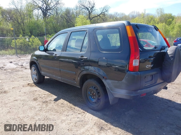 2002 Honda CR-V LX with VIN JHLRD68402C018458, listed as a IAAI auction lot 42206935 with 212,229 mi miles and . Bid and sale history available at carsss.com. Image 3.