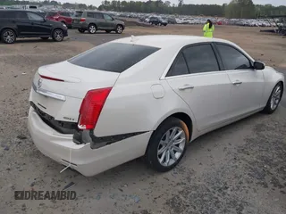 2014 Cadillac CTS Sedan RWD with VIN 1G6AP5SXXE0178113, listed as a IAAI auction lot 41982807 with 111,734 mi miles. Bid and sale history available at carsss.com. Image 4.