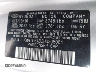 2017 Hyundai Veloster Value Edition with VIN KMHTC6AD2HU308084, listed as a IAAI auction lot 41734062 with 59,354 mi miles. Bid and sale history available at carsss.com. Image 9.
