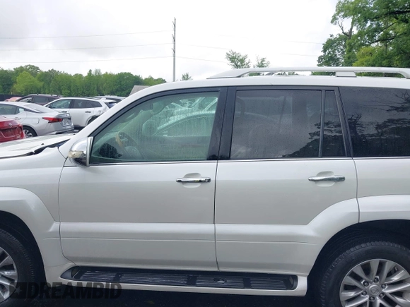2004 Lexus GX 470 z VIN JTJBT20X840026924, wystawiony jako IAAI lot #42256914 z przebiegiem 311 585 mil mil oraz . Historia ofert i sprzedaży dostępna na DreamBid. Obrazek 14.