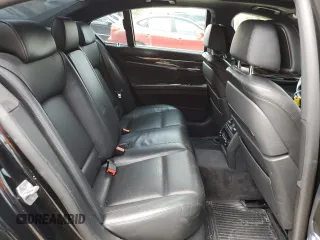 2015 BMW 7 Series 750i xDrive with VIN WBAYB6C53FD965991, listed as a Copart auction lot 64437854 with 115,862 mi miles and Salvage Title. Bid and sale history available at carsss.com. Image 10.