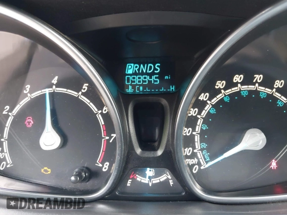 2016 Ford Fiesta SE with VIN 3FADP4EJ4GM199945, listed as a IAAI auction lot 41881260 with 98,945 mi miles. Bid and sale history available at carsss.com. Image 7.