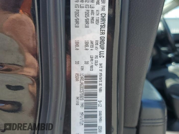 2013 Dodge Durango SXT with VIN 1C4RDJAG3DC575923, listed as a Copart auction lot 60100195 with 211,606 mi miles and Salvage title. Bid and sale history available at DreamBid. Image 14.