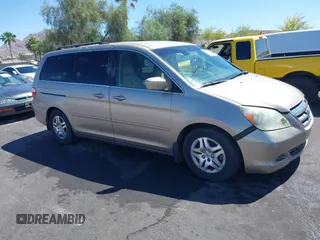 2007 Honda Odyssey EX z VIN 5FNRL38407B123509, wystawiony jako IAAI lot #42238353 z przebiegiem 200 111 mil mil oraz . Historia ofert i sprzedaży dostępna na DreamBid. Obrazek 13.