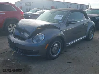 2013 Volkswagen Beetle Convertible 2.5L with VIN 3VW5X7AT3DM811083, listed as a IAAI auction lot 41168960 with 116,210 mi miles. Bid and sale history available at carsss.com. Image 17.