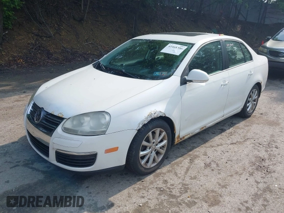 2009 Volkswagen Jetta S z VIN 3VWHM71KX9M134604, wystawiony jako IAAI lot #42468306 z przebiegiem 109 509 mil mil oraz . Historia ofert i sprzedaży dostępna na DreamBid. Obrazek 2.