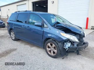 2015 Toyota Sienna LE AAS with VIN 5TDKK3DCXFS624984, listed as a IAAI auction lot 42560632 with 169,034 mi miles and . Bid and sale history available at DreamBid. Image 1.
