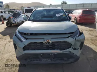 2022 Toyota RAV4 XLE with VIN 2T3W1RFV0NW189461, listed as a Copart auction lot 57841765 with 18,067 mi miles and Salvage title. Bid and sale history available at DreamBid. Image 5.