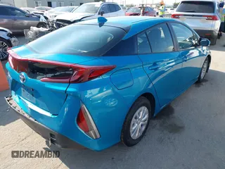 2022 Toyota Prius LE with VIN JTDKAMFP8N3209977, listed as a IAAI auction lot 42777763 with 52,995 mi miles and . Bid and sale history available at DreamBid. Image 4.