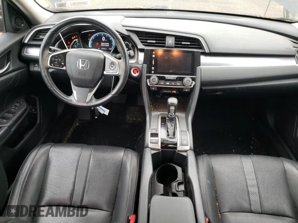 2017 Honda Civic EX-L with VIN 19XFC1F73HE201731, listed as a Copart auction lot 60104785 with 63,932 mi miles and Salvage title. Bid and sale history available at DreamBid. Image 8.