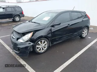 2012 Hyundai Accent SE with VIN KMHCU5AE1CU035390, listed as a IAAI auction lot 41765900 with 127,685 mi miles. Bid and sale history available at carsss.com. Image 2.