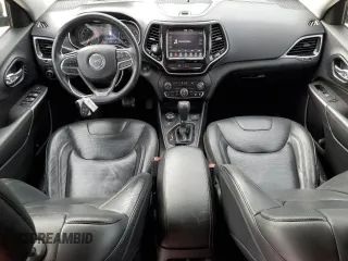 2019 Jeep Cherokee Limited with VIN 1C4PJMDX5KD134895, listed as a Copart auction lot 45327835 with 92,428 mi miles and Salvage Title. Bid and sale history available at DreamBid. Image 8.