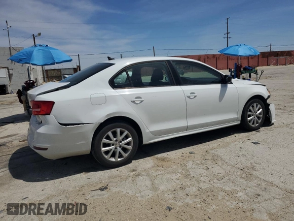 2015 Volkswagen Jetta SE z VIN 3VWD17AJ4FM338597, wystawiony jako Copart lot #59349565 z przebiegiem 50 108 mil mil oraz Szkoda całkowita • Salvage title. Historia ofert i sprzedaży dostępna na DreamBid. Obrazek 3.