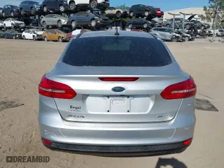 2016 Ford Focus SE with VIN 1FADP3F27GL320227, listed as a IAAI auction lot 41941368 with 128,527 mi miles. Bid and sale history available at carsss.com. Image 15.
