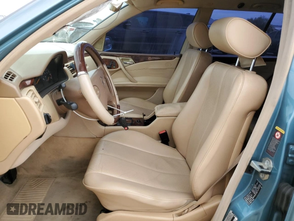 2001 Mercedes-Benz E-Class with VIN WDBJH65J01B292156, listed as a Copart auction lot 49556935 with 179,223 mi miles and Salvage Title. Bid and sale history available at carsss.com. Image 7.
