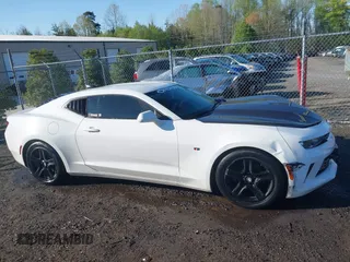 2017 Chevrolet Camaro 1LT with VIN 1G1FA1RX6H0136098, listed as a IAAI auction lot 41978704 with 136,637 mi miles and . Bid and sale history available at carsss.com. Image 13.