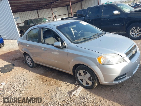 2009 Chevrolet Aveo 1LT z VIN KL1TD56E49B372791, wystawiony jako IAAI lot #41890124 z przebiegiem 118 648 mil mil oraz . Historia ofert i sprzedaży dostępna na DreamBid. Obrazek 13.