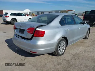 2012 Volkswagen Jetta Sedan SE w/Convenience PZEV with VIN 3VWDP7AJ7CM314482, listed as a IAAI auction lot 41283964 with 159,474 mi miles. Bid and sale history available at carsss.com. Image 4.