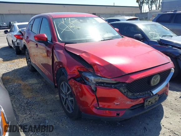 2018 Mazda CX-5 Grand Touring with VIN JM3KFBDM2J0333017, listed as a IAAI auction lot 41850431 with 85,000 mi miles. Bid and sale history available at carsss.com. Image 1.